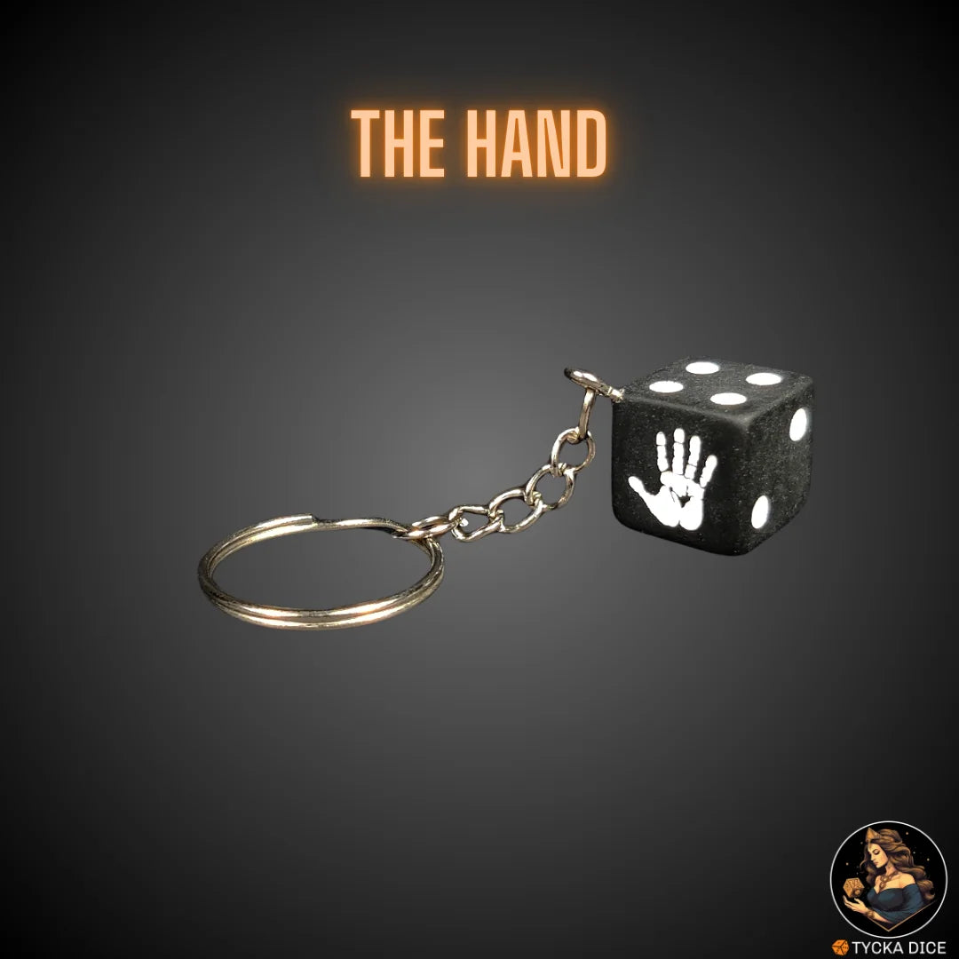Keychain – matte black die with white hand symbol – obedience themed