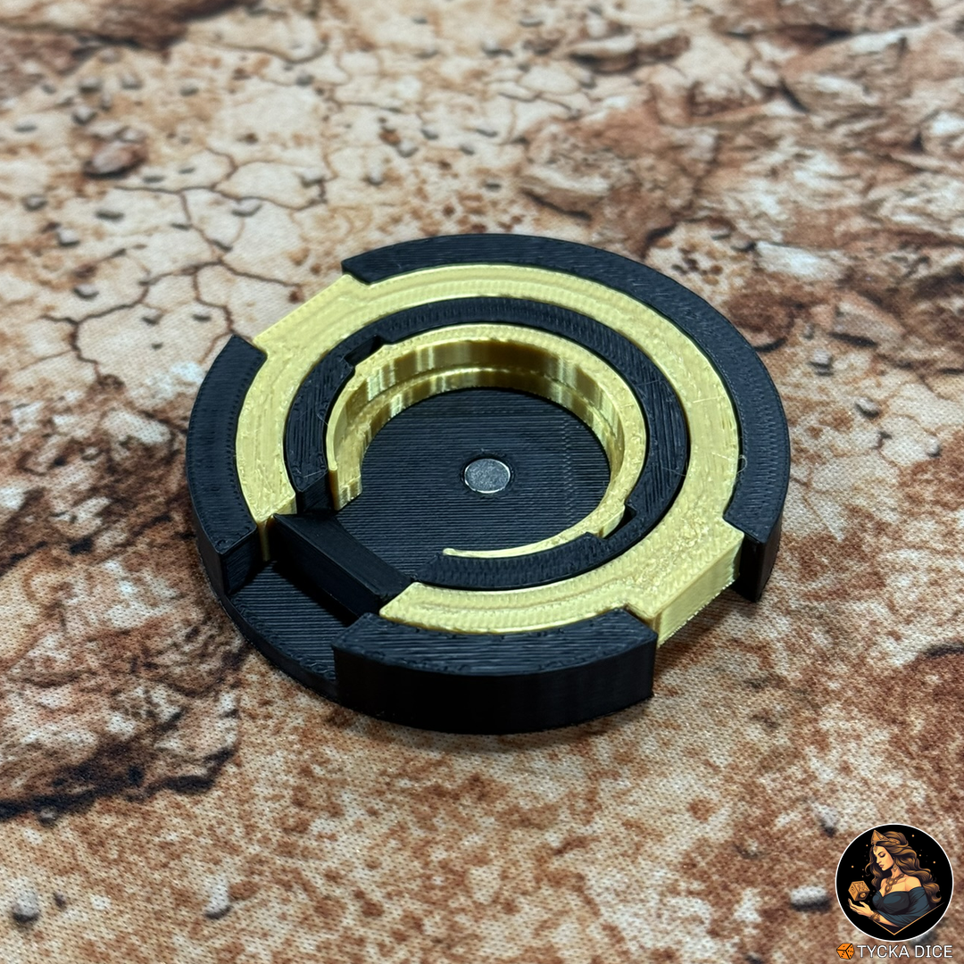 Easy Magnet - Rounded | Assembled magnet centering tool in black and gold, angled view | TYCKA DICE