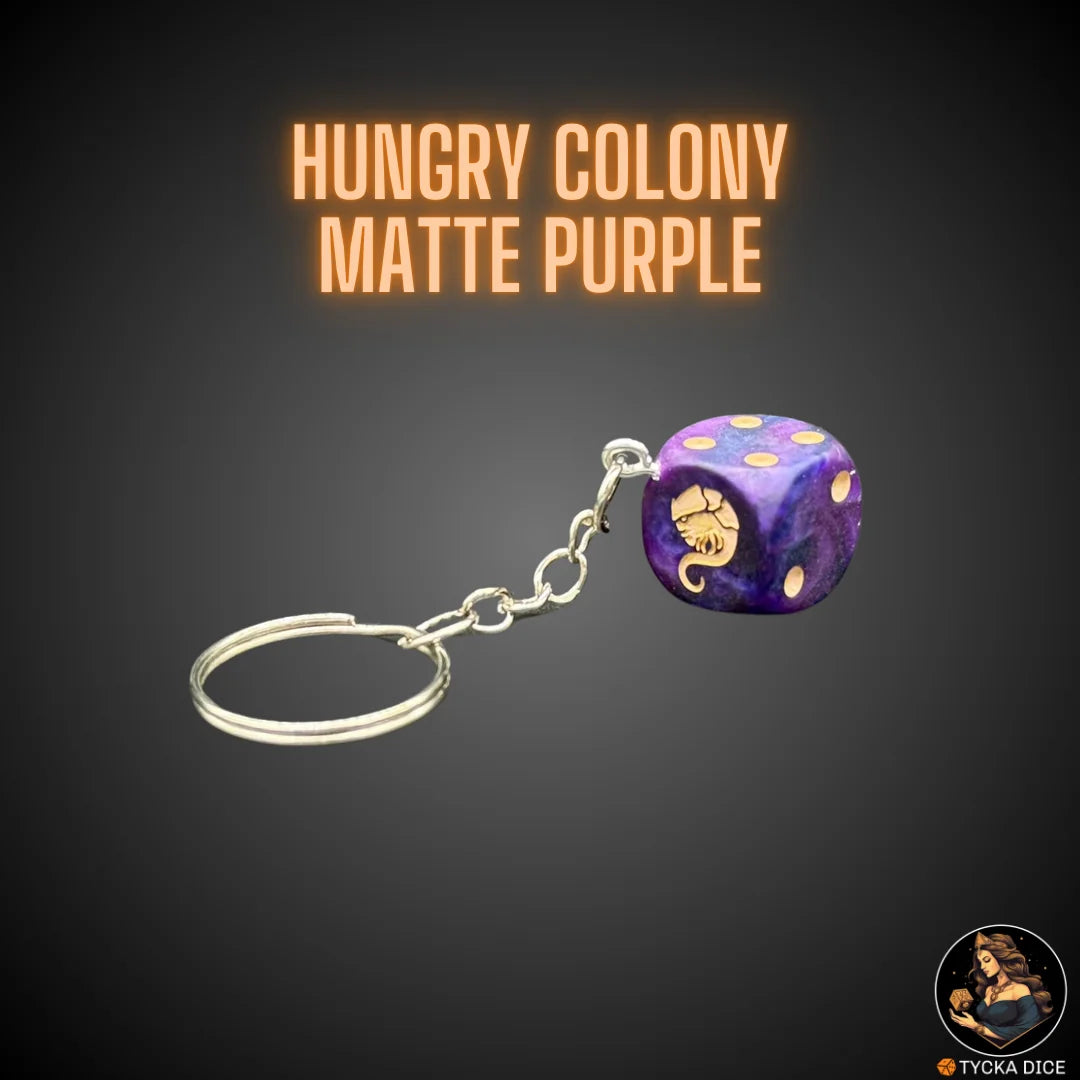 Keychain – matte purple resin die – swarm hive theme with flesh engravings