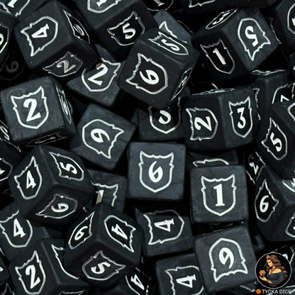 Ignite Die (1-6) — black resin D6 macro view, engraved silver shield and white numbers