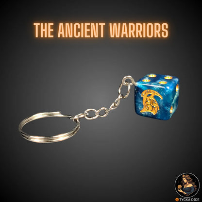 Keychain – blue marble die with golden crest – ancient elf warrior theme