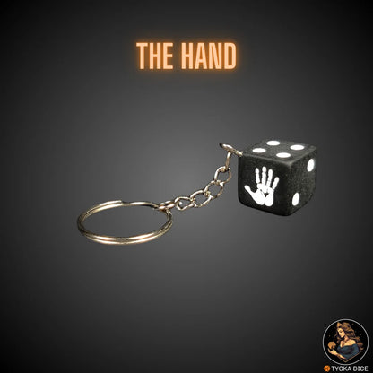 Keychain – matte black die with white hand symbol – obedience themed